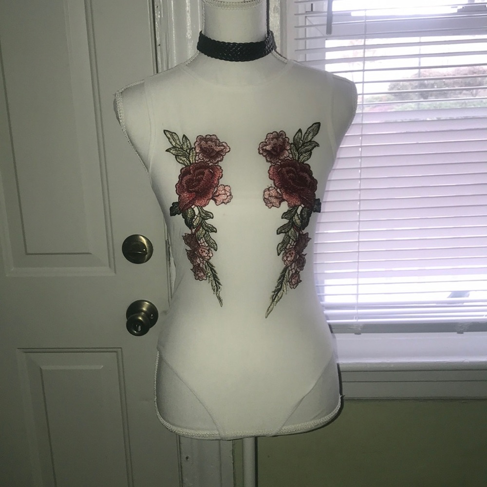Body suit with flowers detail/ price firm